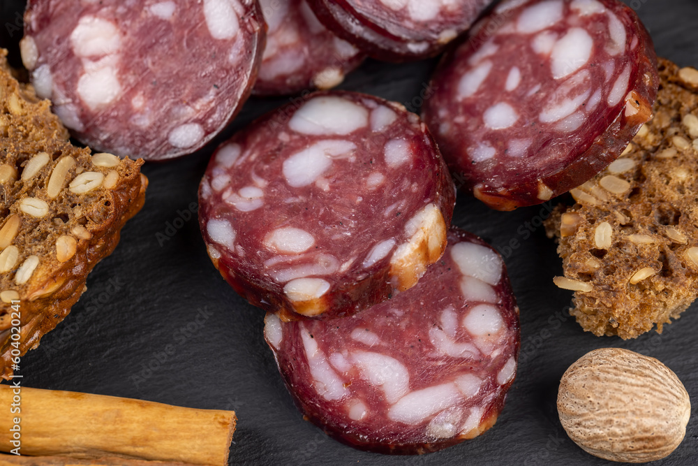 sliced high-quality pork sausage with the addition of lard pieces sliced high-quality pork sausage with the addition of lard pieces