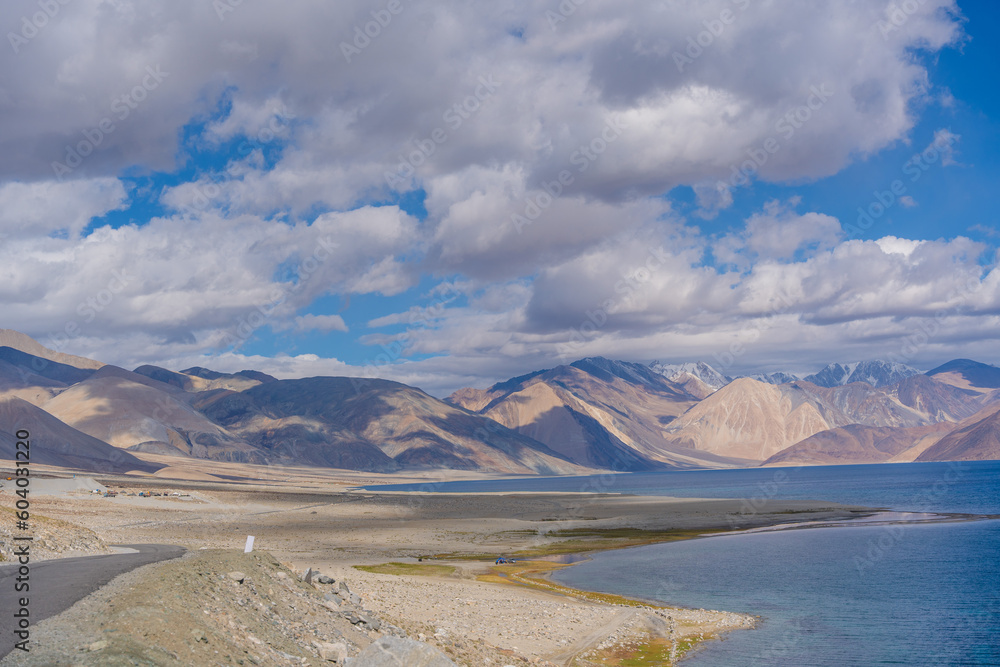 Pangong Lake in Ladakh, North India. Pangong Tso is an endorheic lake in the Himalayas situated at a height of about 4,350 m. It is 134 km long and extends from India to Tibet