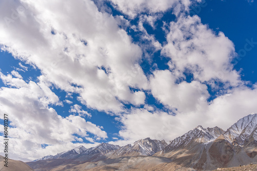 snow-covered mountains, and blue sky at Pangong Lake, Ladakh, India
