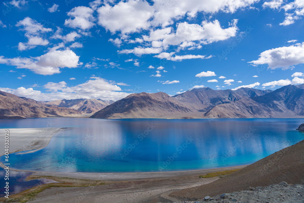 Mountains and Pangong tso (Lake). It is huge lake in Ladakh, altitude 4,350 m (14,270 ft). It is 134 km (83 mi) long and extends from India to Tibet. Leh, Ladakh, Jammu and Kashmir, India
Mountains and Pangong tso (Lake). It is huge lake in Ladakh, altitude 4,350 m (14,270 ft). It is 134 km (83 mi) long and extends from India to Tibet. Leh, Ladakh, Jammu and Kashmir, India