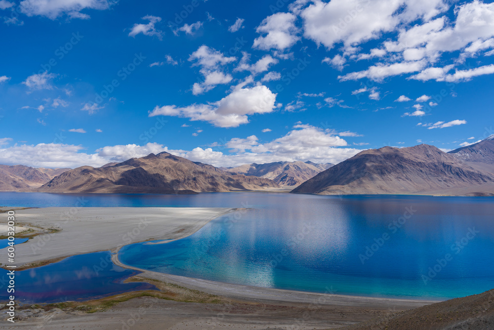 Mountains and Pangong tso (Lake). It is huge lake in Ladakh, altitude 4,350 m (14,270 ft). It is 134 km (83 mi) long and extends from India to Tibet. Leh, Ladakh, Jammu and Kashmir, India
Mountains and Pangong tso (Lake). It is huge lake in Ladakh, altitude 4,350 m (14,270 ft). It is 134 km (83 mi) long and extends from India to Tibet. Leh, Ladakh, Jammu and Kashmir, India