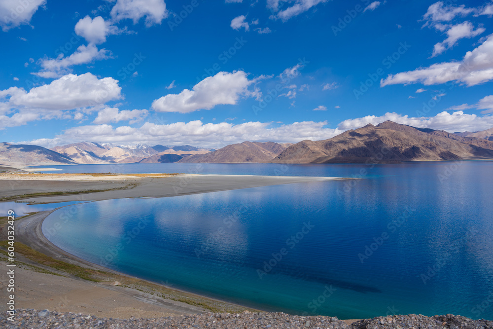 Mountains and Pangong tso (Lake). It is huge lake in Ladakh, altitude 4,350 m (14,270 ft). It is 134 km (83 mi) long and extends from India to Tibet. Leh, Ladakh, Jammu and Kashmir, India
Mountains and Pangong tso (Lake). It is huge lake in Ladakh, altitude 4,350 m (14,270 ft). It is 134 km (83 mi) long and extends from India to Tibet. Leh, Ladakh, Jammu and Kashmir, India