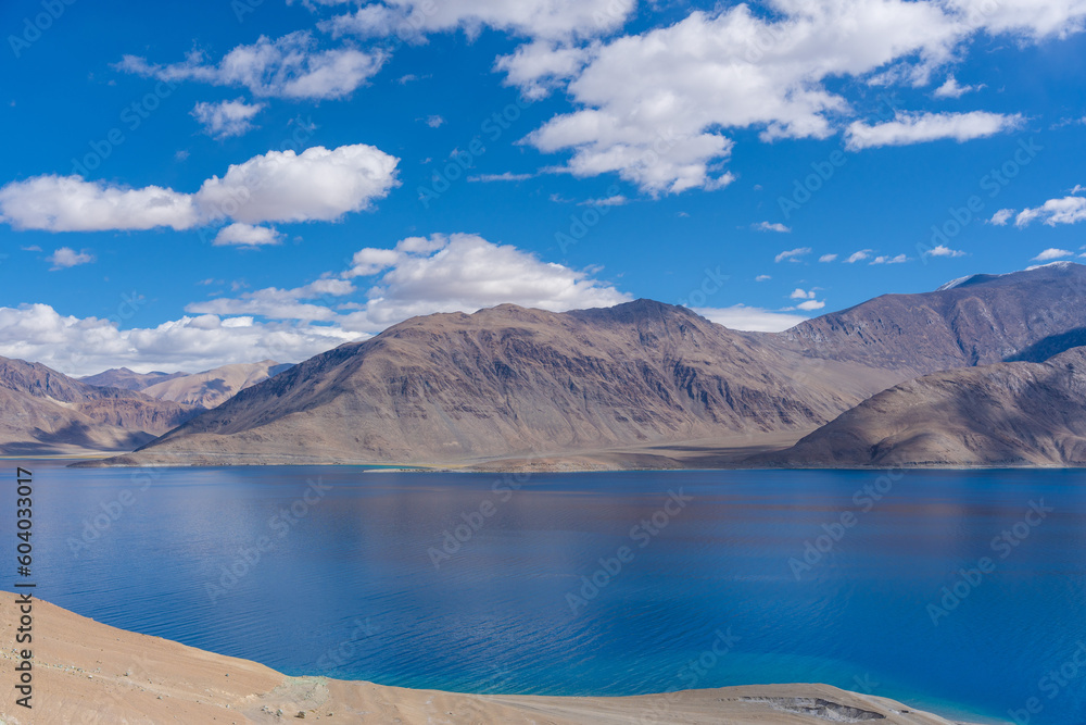 Mountains and Pangong tso (Lake). It is huge lake in Ladakh, altitude 4,350 m (14,270 ft). It is 134 km (83 mi) long and extends from India to Tibet. Leh, Ladakh, Jammu and Kashmir, India
Mountains and Pangong tso (Lake). It is huge lake in Ladakh, altitude 4,350 m (14,270 ft). It is 134 km (83 mi) long and extends from India to Tibet. Leh, Ladakh, Jammu and Kashmir, India