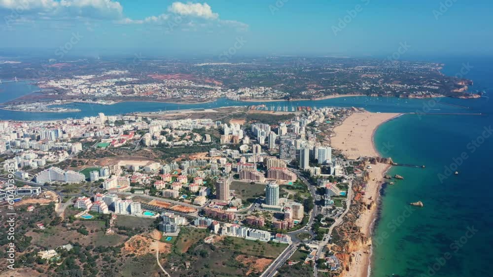 Tourist Portuguese city of Portimao aerial view on a sunny day. South Portugal Algarve. bird-level view Tourist Portuguese city of Portimao aerial view on a sunny day. South Portugal Algarve. bird-level view