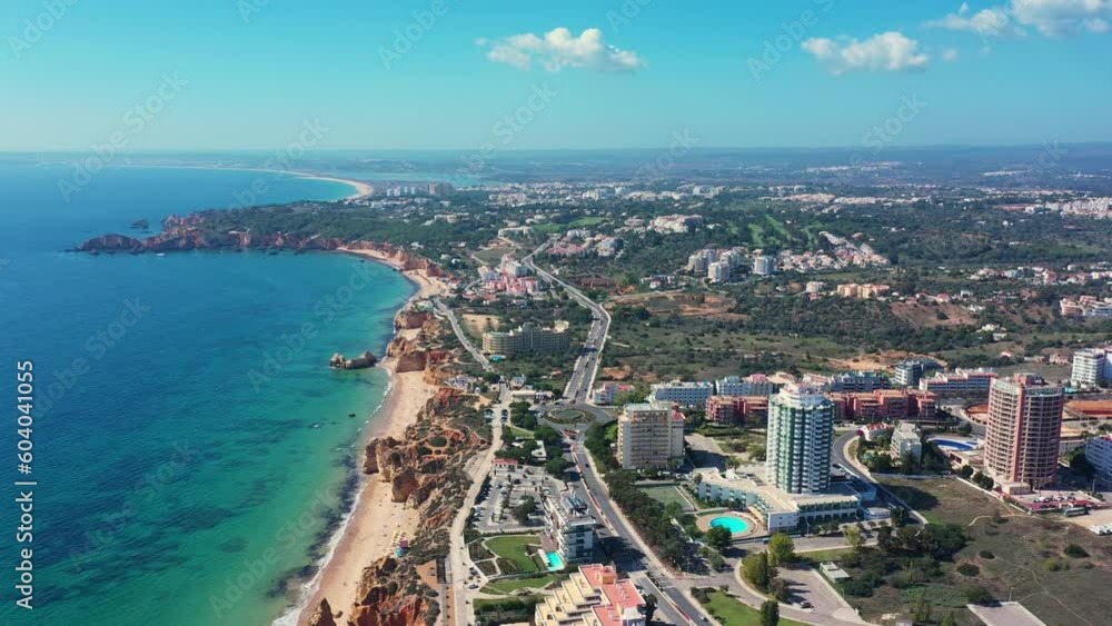 Tourist Portuguese city of Portimao aerial view on a sunny day. South Portugal Algarve. turquoise water and sky Tourist Portuguese city of Portimao aerial view on a sunny day. South Portugal Algarve. turquoise water and sky