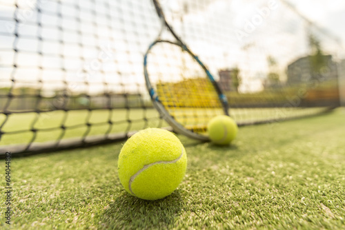 Tennis racket and balls, flat lay. Space for text