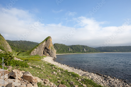 Cape on the shore of the Sea of ​​Okhotsk. Kunashir. Kurile Islandss photo