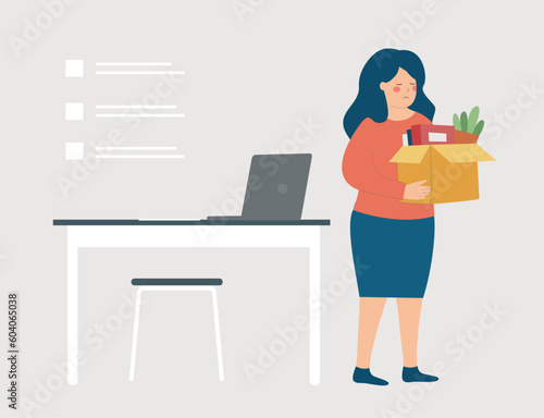 Sad woman gets fired from her office, holds a box with personal things. Dismissed employee quitting her workplace. Concept of unfair expulsion, arbitrary expulsion, Reduction of staff resignation. photo