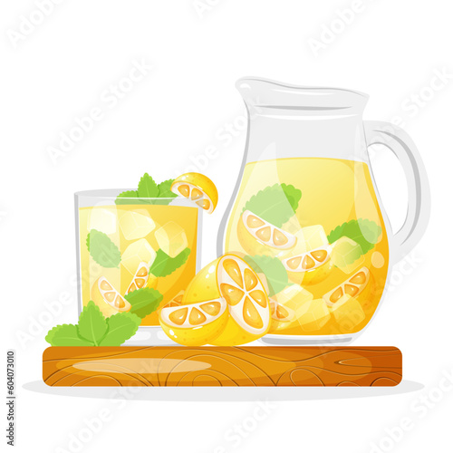 Lemonade in a glass cup and jug standing on cutting board decorated with mint and lemon.