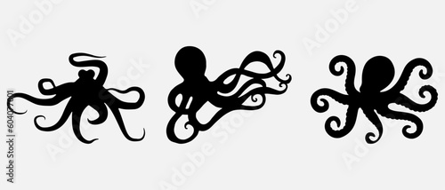 isolated black silhouette of a octopus , vector collection