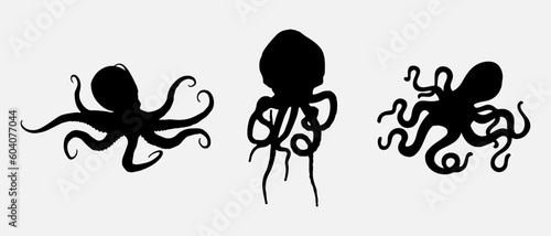 isolated black silhouette of a octopus , vector collection