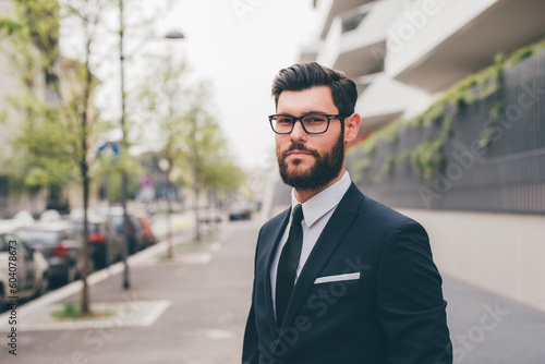 Young elegant professional executive bearded businessman posing outdoors © Eugenio Marongiu