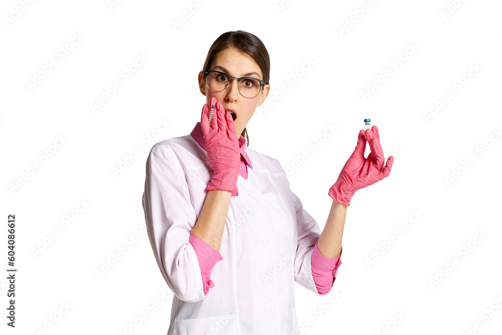 Yougn woman, nurse, doctor in lab coat and stethoscope, holding syringe with meds isolated over white background. Concept of medicine, occupational, healthcare, profession, treatment Yougn woman, nurse, doctor in lab coat and stethoscope, holding syringe with meds isolated over white background. Concept of medicine, occupational, healthcare, profession, treatment
