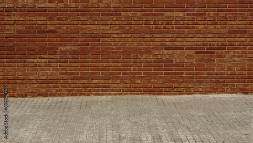 urban sidewalk with red brick wall