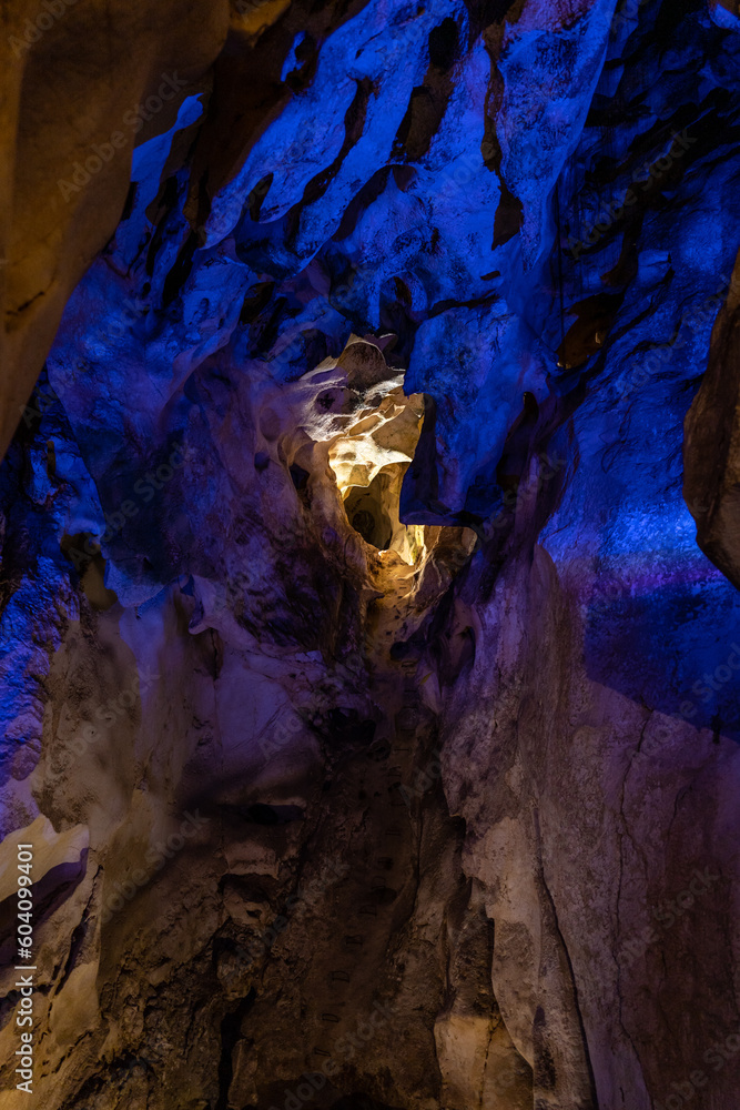 rock formations inside an illuminated cave