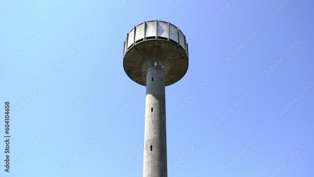 high old tower made of grey stone with wooden ground high old tower made of grey stone with wooden ground