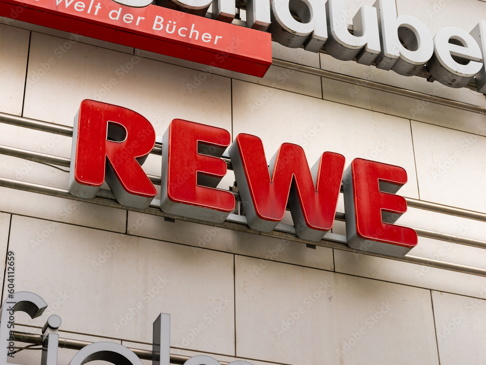 DRESDEN, GERMANY 16. May 2023 Rewe logo of the supermarket on a