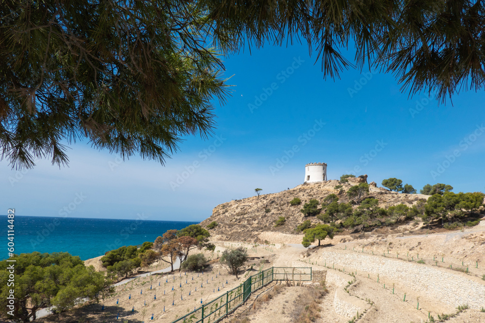 Villajoyosa, Spain. Panoramic view to Villajoyosa with tower Torre de Malladeta and Mediterranean Sea. La Vila Joiosa is beautiful coastal town in Alicante province, Valencian Community, Spain