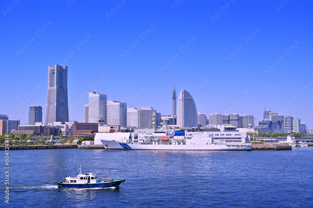 cityscape of skyline Yokohama and Yokohama Port city with blue sky background, Minatomirai area in Yokohama city, Kanagawa, Japan