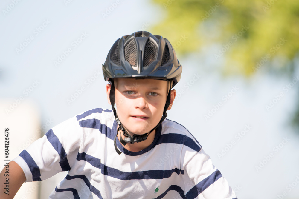 portrait of a man wearing helmet and driving bicycle very fast portrait of a man wearing helmet and driving bicycle very fast