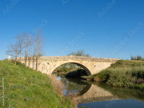 Puente de Carrecalzada (siglo XVIII), sobre el Canal de Castilla. Melgar de Fernamental, Burgos, España. photo