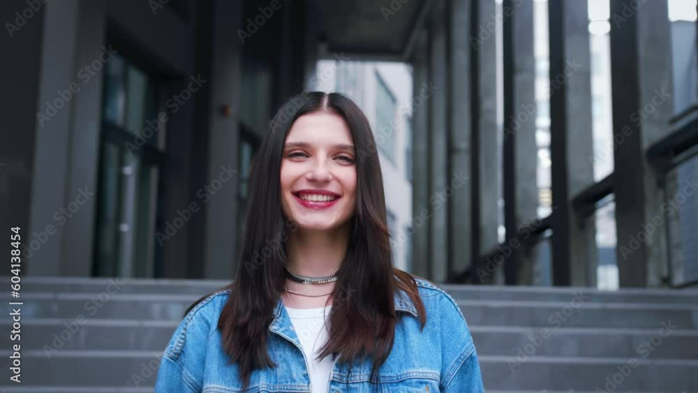 Portrait young attractive smile woman look at camera at city center feel happy fashion girl summer face Portrait young attractive smile woman look at camera at city center feel happy fashion girl summer face
