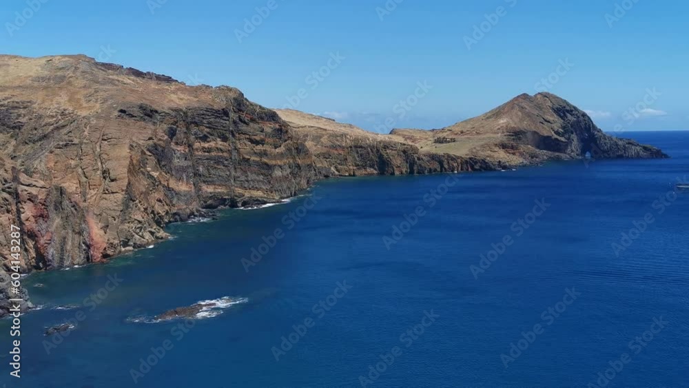 Amazing panoramic view at the huge natural island cliffs, St. Lourenço Cape or Cabo de São Lourenço, group of tourists hiking, on Madeira Island, Portugal Amazing panoramic view at the huge natural island cliffs, St. Lourenço Cape or Cabo de São Lourenço, group of tourists hiking, on Madeira Island, Portugal