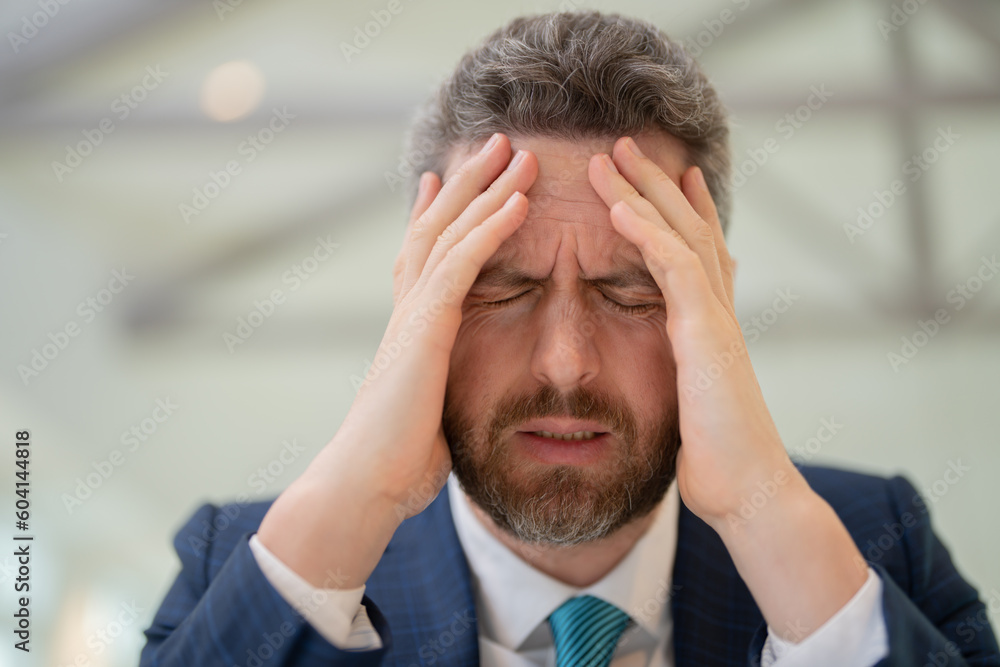 Head pain concept. Cephalalgia and migraine. Man with sinus headache