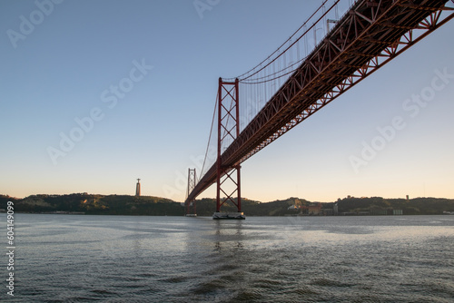 View of Ponte 25 de Abril Bridge on the Tagus River at sunset, Lisbon, Portugal