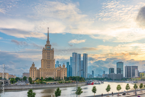 high-rise stalinist building near river at summer sunset in Moscow, Russia. Historic name is Hotel Ukraine.
