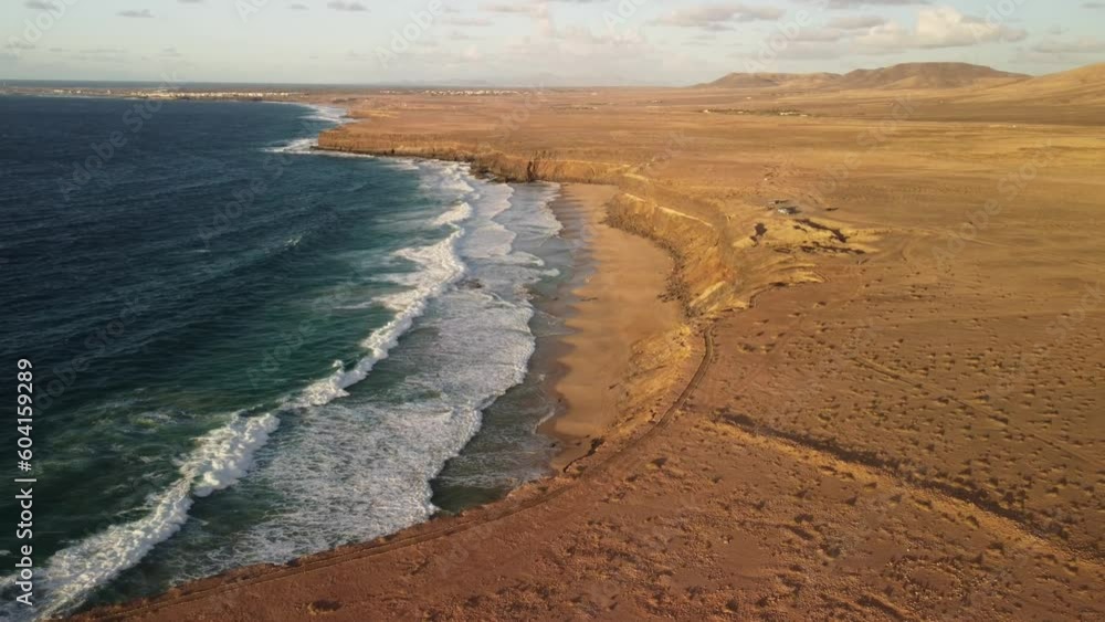 View of the beautiful coastline with high banks. View of the beautiful coastline with high banks.