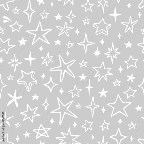Vector seamless pattern with cute stars and sparkles. Hand drawn  doodle style. Design for fabric  wrapping  stationery  wallpaper  textile.