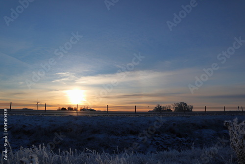 Swedish road during the winter. Highway called E20. December photo. Sunrise early morning. Skara, Sweden, Scandinavia, Europe.