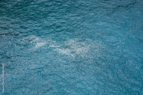 top view of blue frothy sea background
