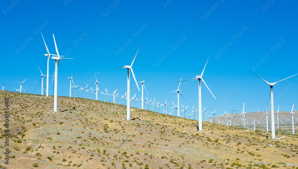 A Windmill Electric Generators Wind Farm near Whitewater Pass and Palm Springs, California, Making Renewable Energy from the Wind in the Desert A Windmill Electric Generators Wind Farm near Whitewater Pass and Palm Springs, California, Making Renewable Energy from the Wind in the Desert