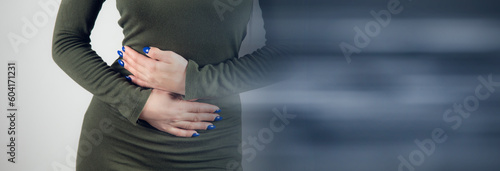 Woman having strong stomach ache