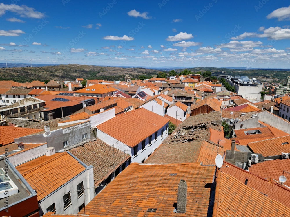 Aerial view of Guarda, old town in Portugal, old houses, orange roof, sunny day, spain