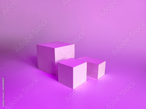 Realistic pink stand podium with square overlay background. Luxury geometric forms. Abstract minimal scene for mockup products, square stage for showcase, promotion display.