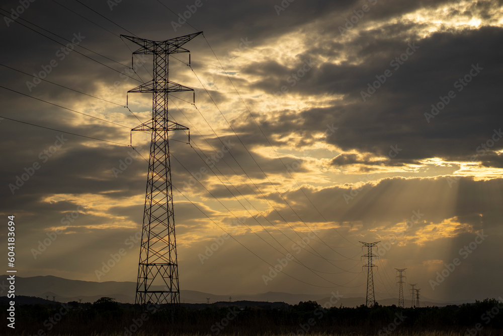 Photo of a landscape with an electricity tower