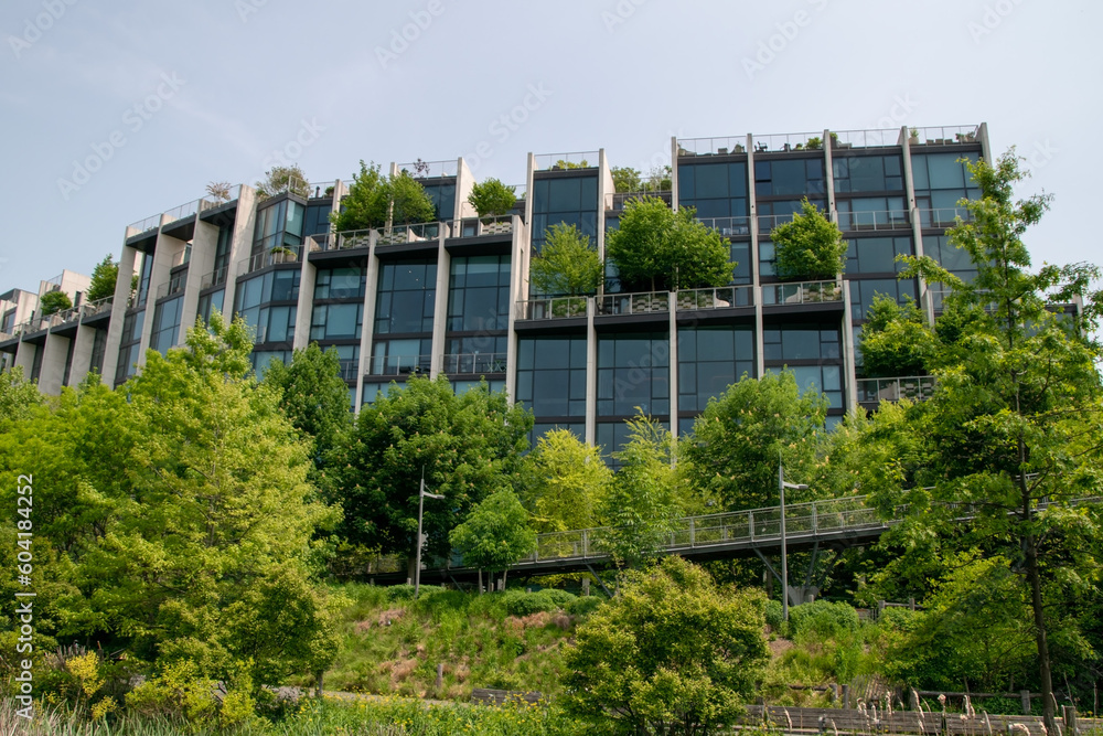 Modern apartment building near the Brooklyn Bridge Park, waterfront overlooking Manhattan, cityscape, reportage photography, Brooklyn Heights, NY, USA