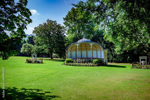 Grassy park with gazebo and trees in Bath England