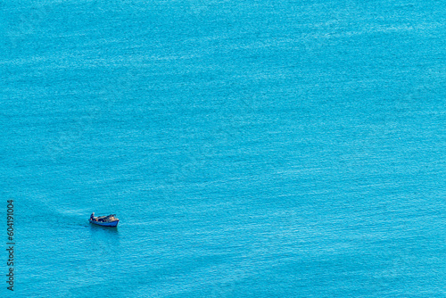 A Vietnamese boat sailing in the blue sea © William Huang