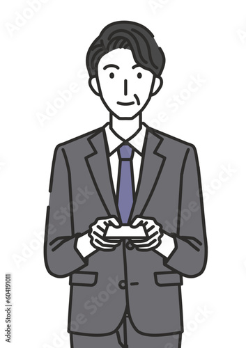 名刺を渡す40代・50代男性