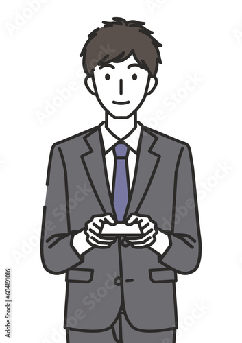 名刺を渡す男性