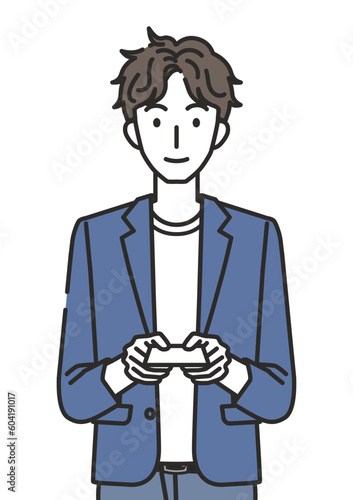 名刺を渡すオフィスカジュアルコーデの男性