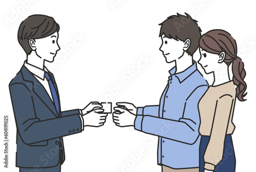名刺を受け取る夫婦