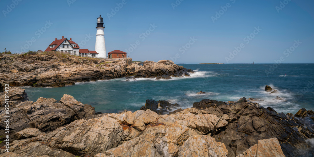 Lighthouse on the coast of the Atlantic Ocean. Portland Head Light, built in 1791 on the rocky coastline in Ft. Williams Park, in Cape Elizabeth, Maine
