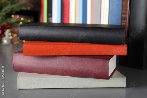 Φωτογραφία Stack of hardcover books on grey table indoors, closeup