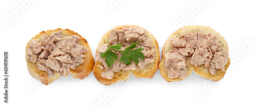 Tasty sandwiches with cod liver and parsley isolated on white, top view