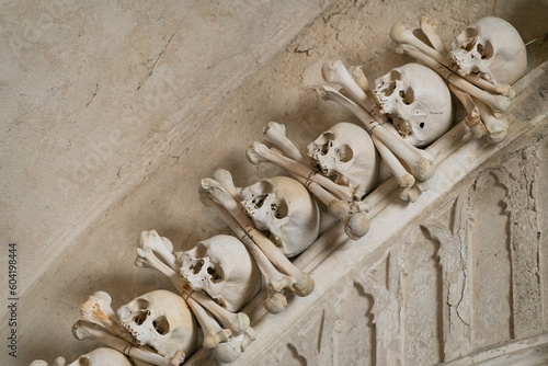 Decoration made of human skulls and bones, interior of Sedlec Ossuary, UNESCO World Heritage Site, Kutna Hora photo